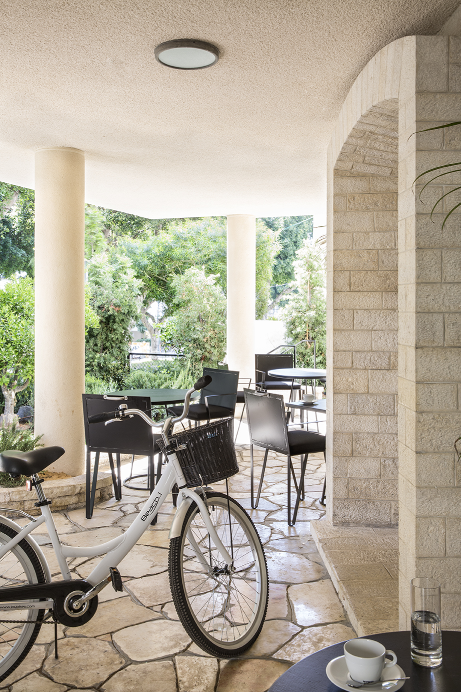 White Villa entrance with bicycle